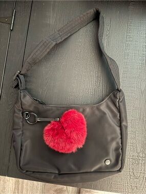 Black Shoulder Bag with Red Heart Pom Charm